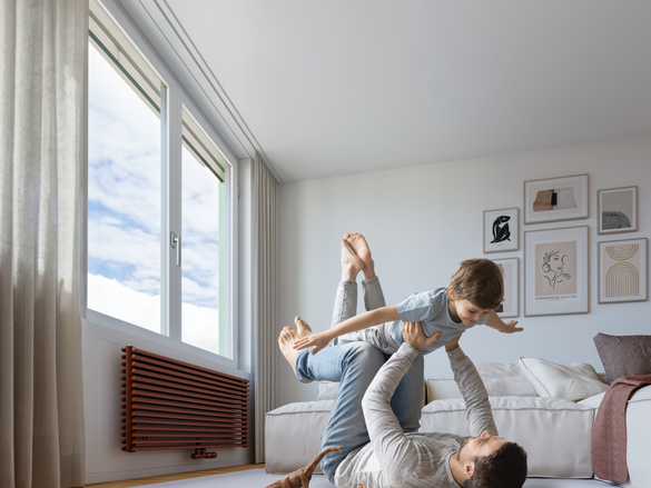 Happy young father lying on floor in living room hold fly with little preschooler son engaged in funny game together, loving dad relax playing with small boy child, enjoy family weekend at home, base iamge AdobeStock_332248000,