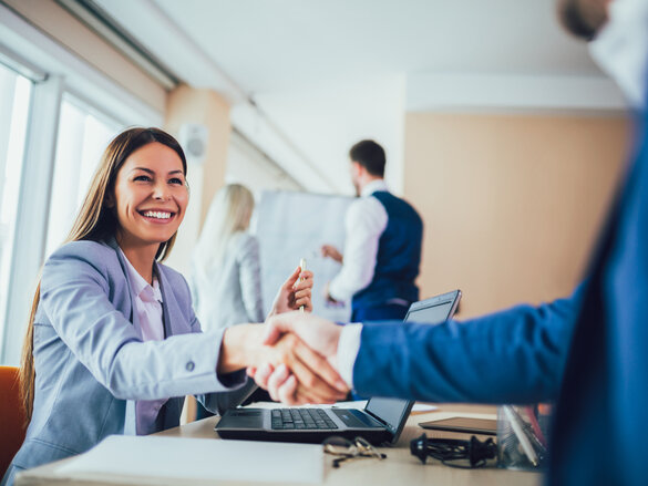 Close-up of business people handshaking